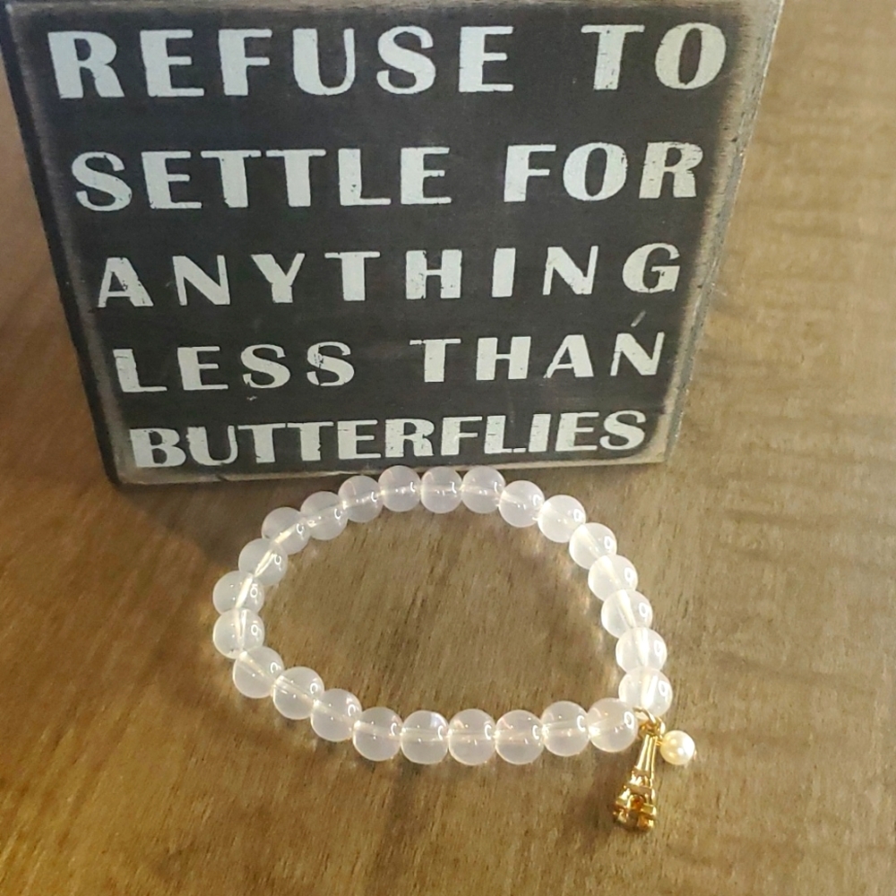 Clear, Eiffel tower and pearl bracelet